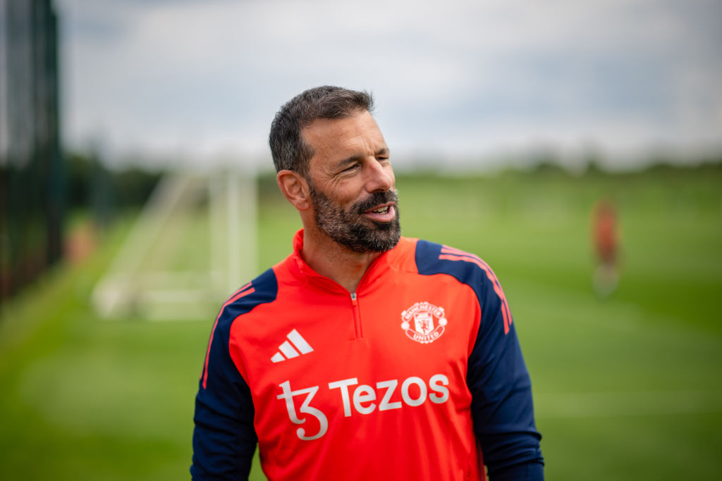 Ruud van Nistelrooy pictured working as Manchester United's assistant manager in July 2024