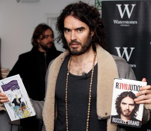 Russell Brand pictured during a Book Signing for "Revolution" at Waterstone's, Picadilly on December 5, 2014 in London, England.